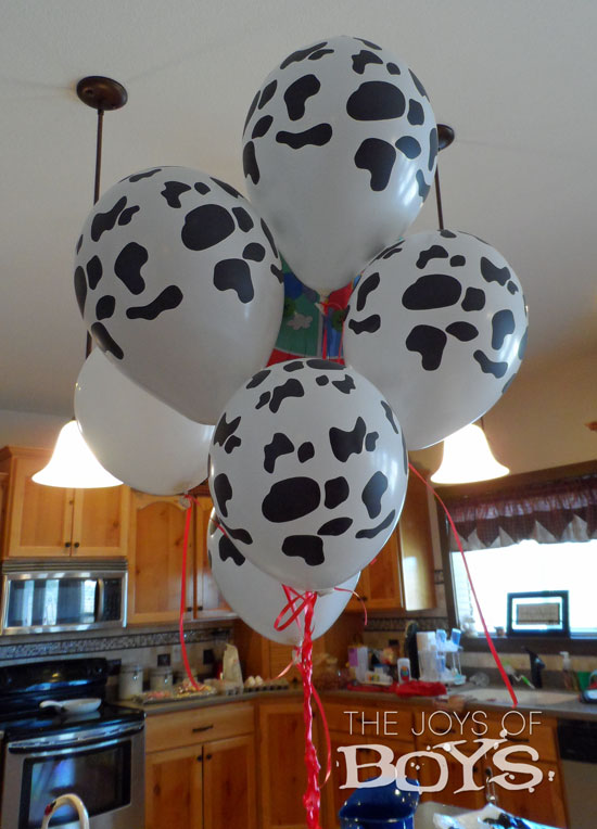 Cow print balloons. Perfect for a farm birthday party.